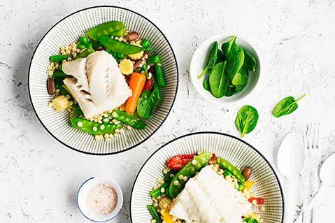 Image of white fish fillets with couscous